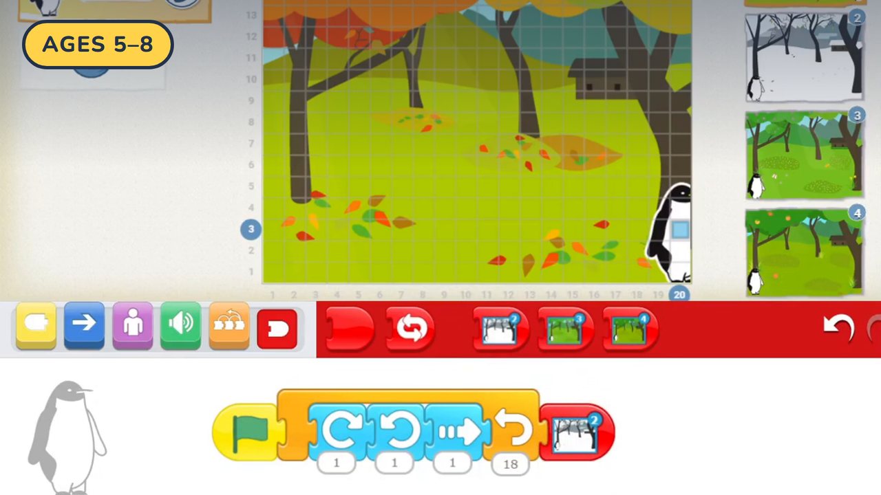A ScratchJr project open on a tablet: a penguin on an autumn stage with its block script below